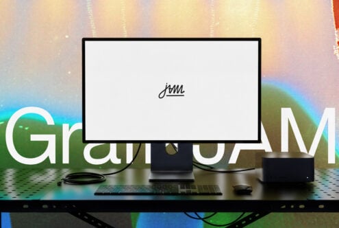 Desktop monitor mockup with blank screen on colorful gradient background with keyboard plus mouse