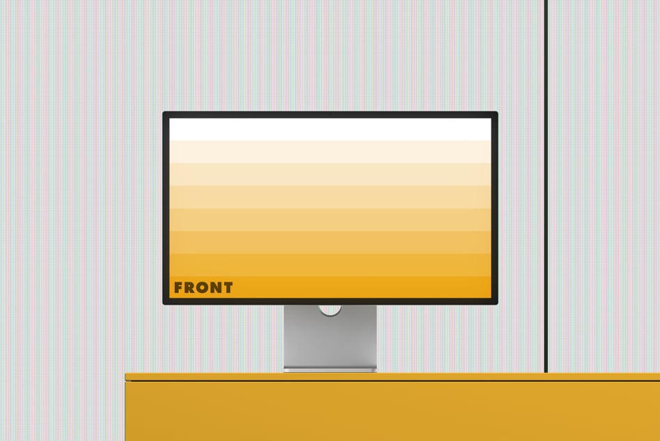 Desktop monitor mockup with yellow gradient display on striped background