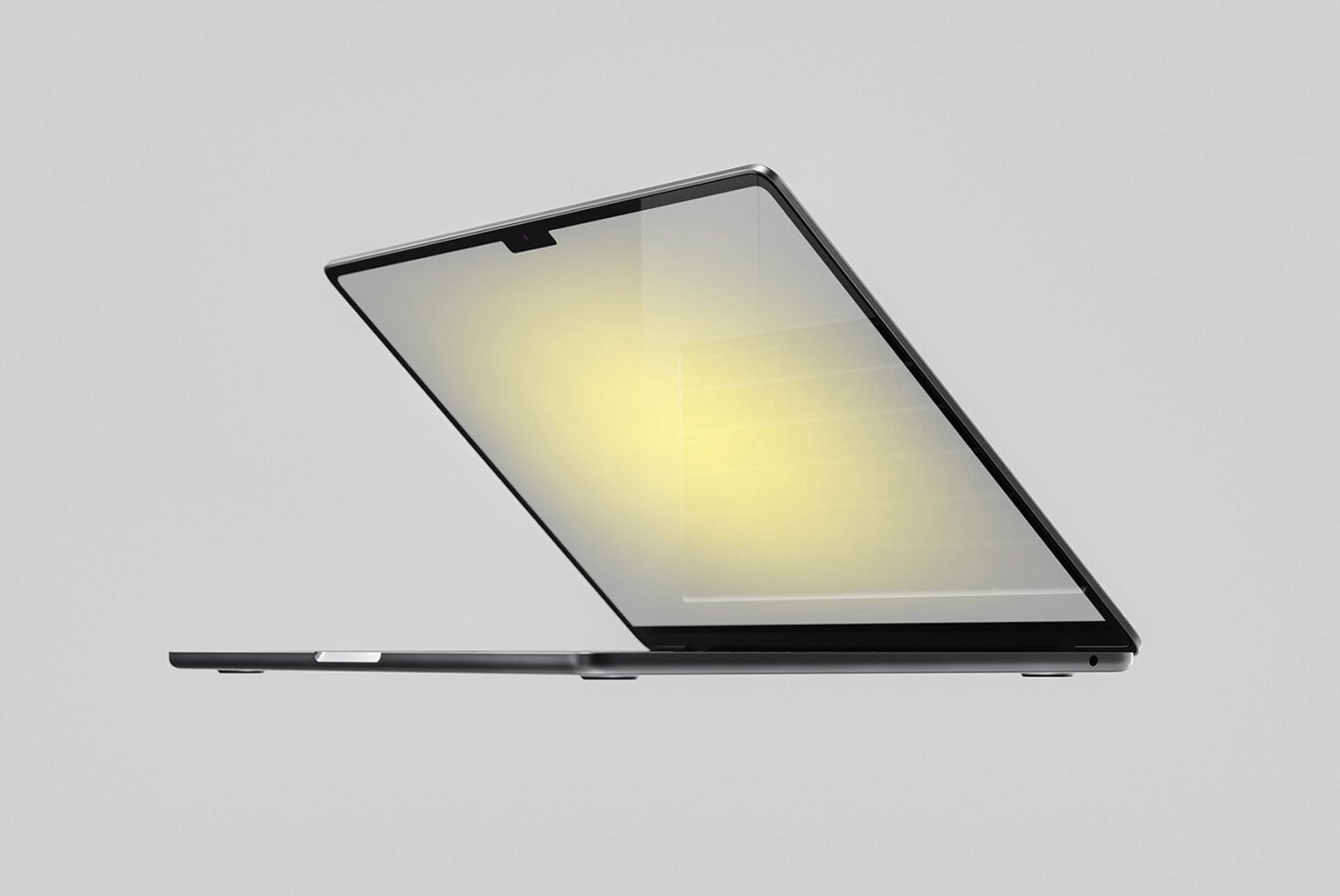 Sleek black laptop mockup with open screen on neutral gray background, side view
