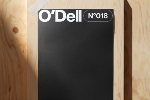 O'Dell N°018 black business card mockup on natural wood surface