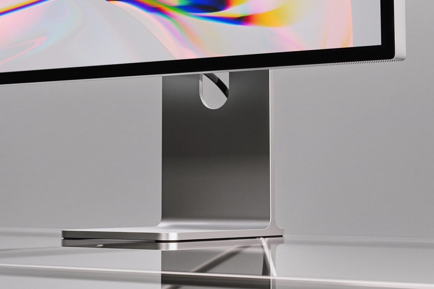 Monitor mockup with colorful spectrum gradient displaying on sleek silver stand
