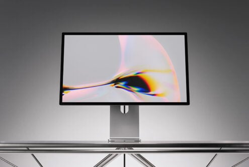 Desktop monitor mockup with vibrant chromatic aberration effect on display