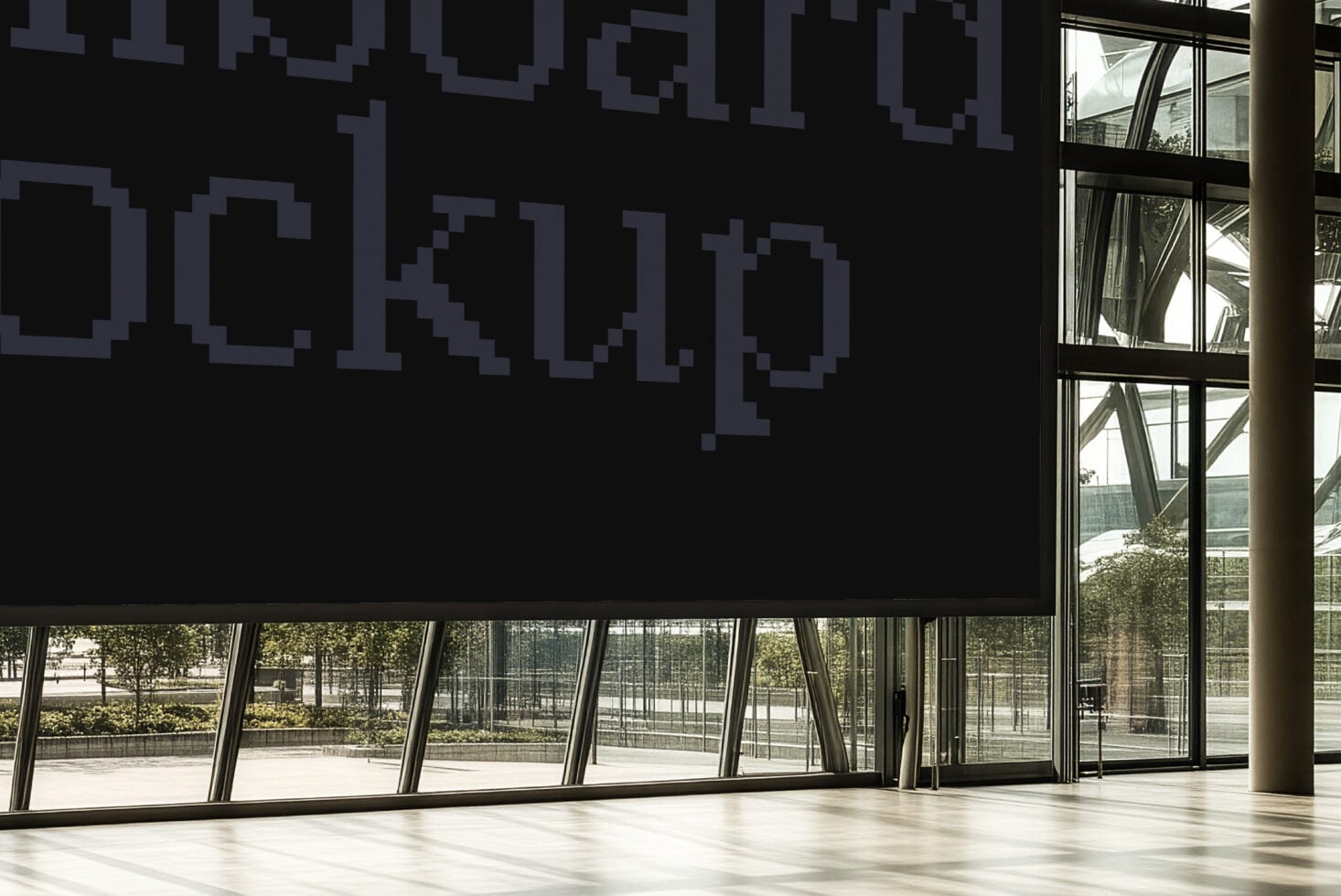 Large interior space with pixelated purple text on black wall, floor-to-ceiling windows overlooking courtyard