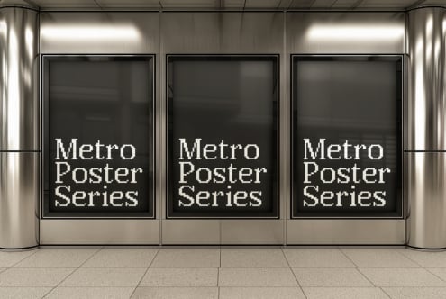 Three large storefront windows with Metro Poster Series text on black displays in modern retail space