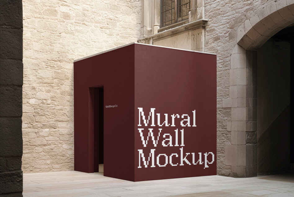 Burgundy box mockup in stone courtyard with white pixelated text on corner face