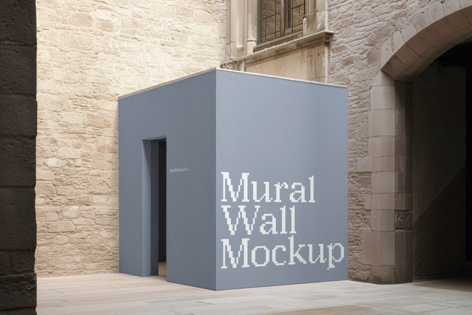 Blue kiosk structure against stone building with "Mural Wall Mockup" text display