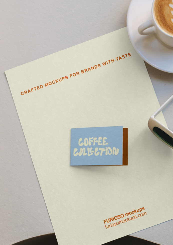 Business card mockup styled with coffee cup on cream paper background