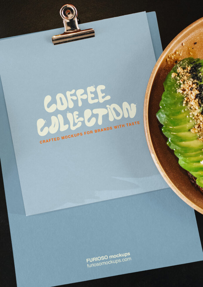 Clipboard mockup with light blue paper showing coffee branding, gold clip, matcha bowl beside it