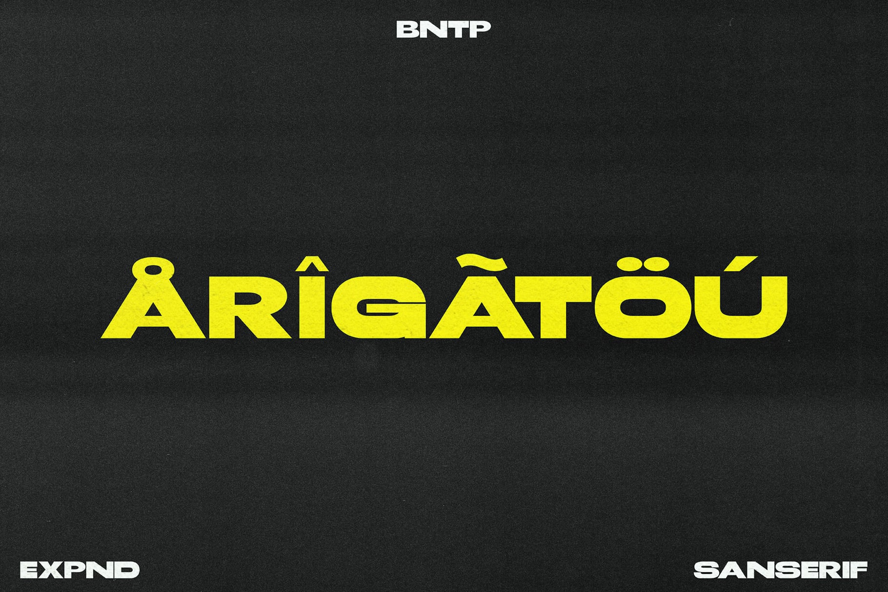 Bold yellow sans serif typeface with geometric cuts on dark textured background