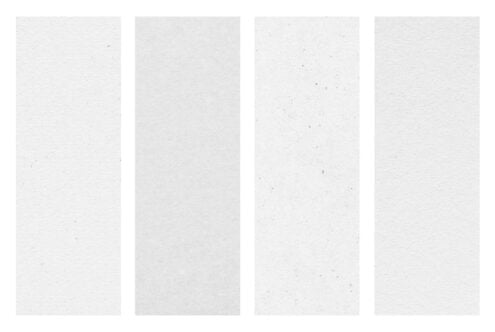 Four tall white speckled paper textures with subtle grain, ready to drop into your designs