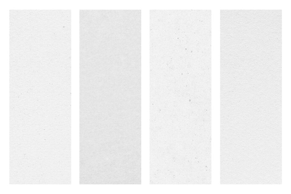 Four tall white speckled paper textures with subtle grain, ready to drop into your designs