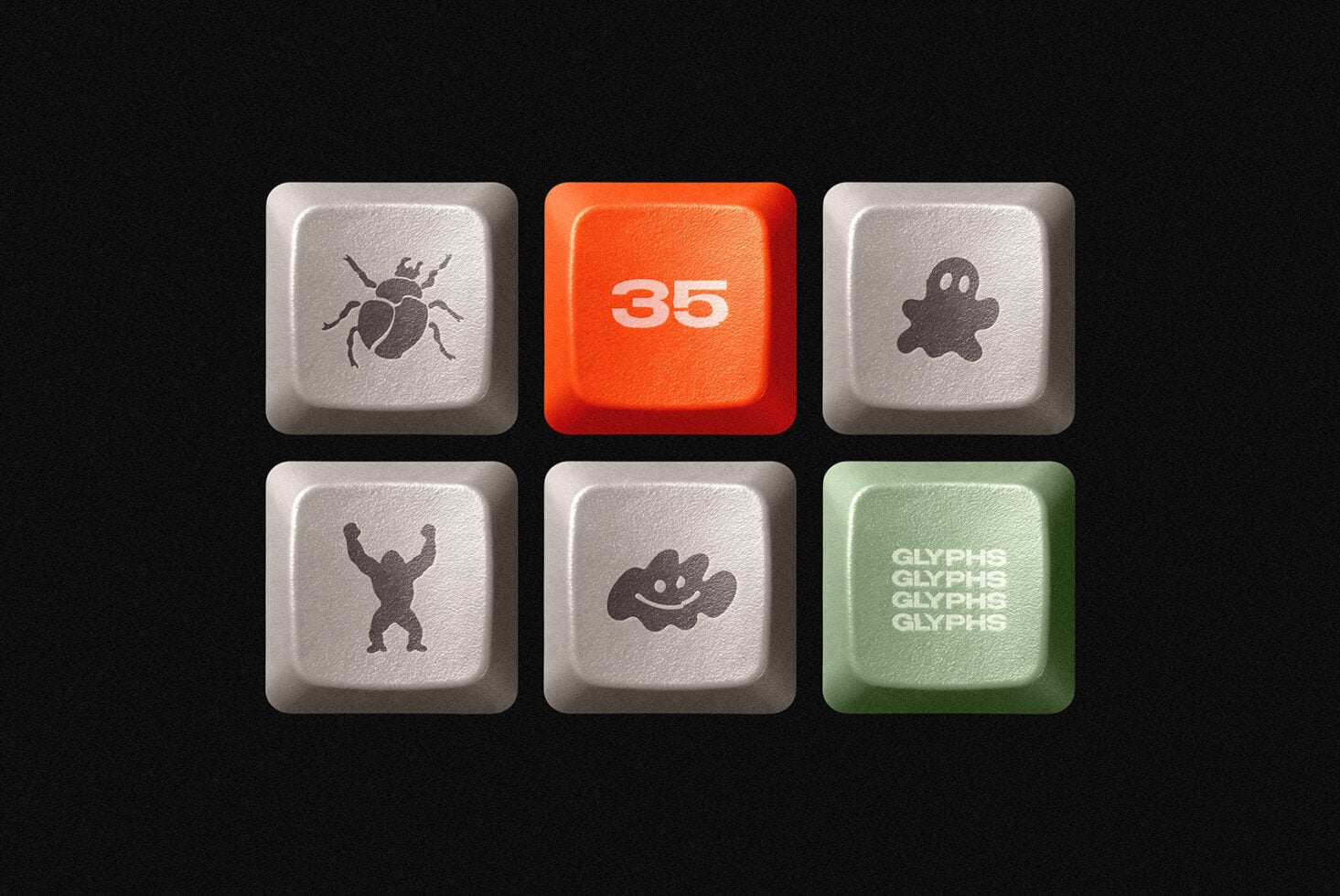 Six textured keyboard keys with cute character icons, one orange key numbered 35 stands out in the center