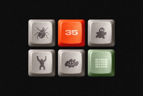Six textured keyboard keys with cute character icons, one orange key numbered 35 stands out in the center