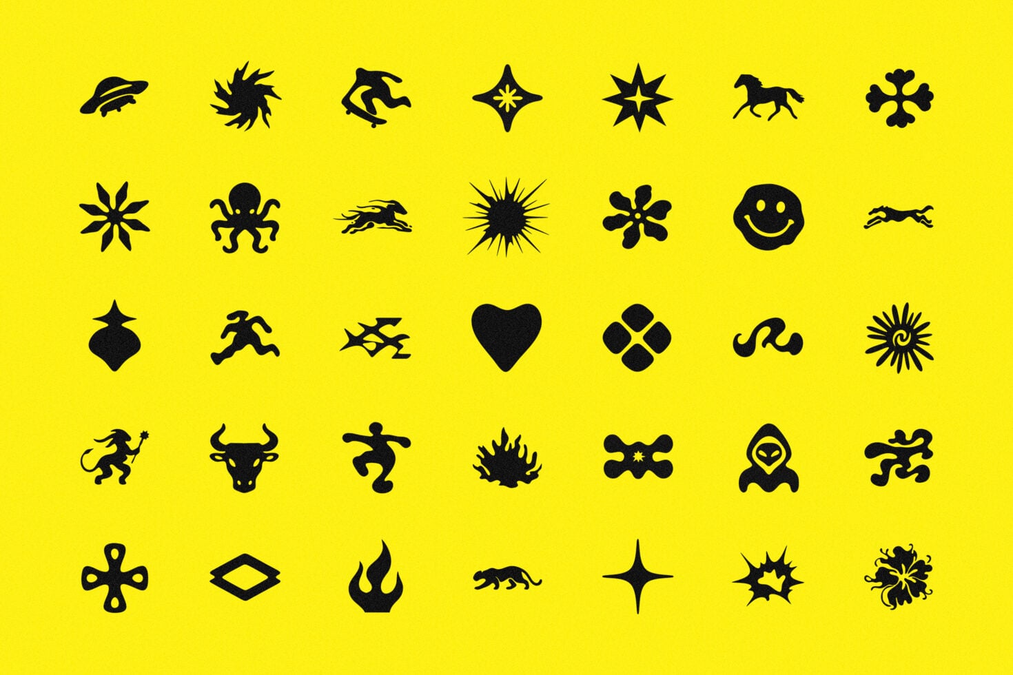 Bold black silhouette icons on bright yellow background with stars, animals, symbols
