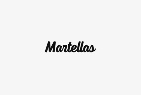 Mantellas bold italic script typeface on light gray background