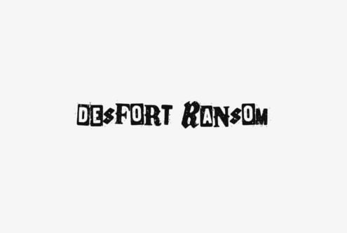 Desfort Ransom distressed typeface with rough texture on light background