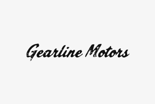 Gearline Motors vintage script logo with distressed texture on light background