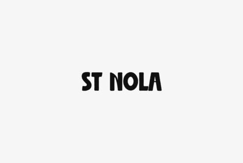 ST NOLA typeface in bold black letters centered on light gray background