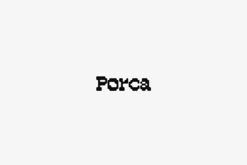 Porca typeface with blocky pixelated letterforms on light gray background