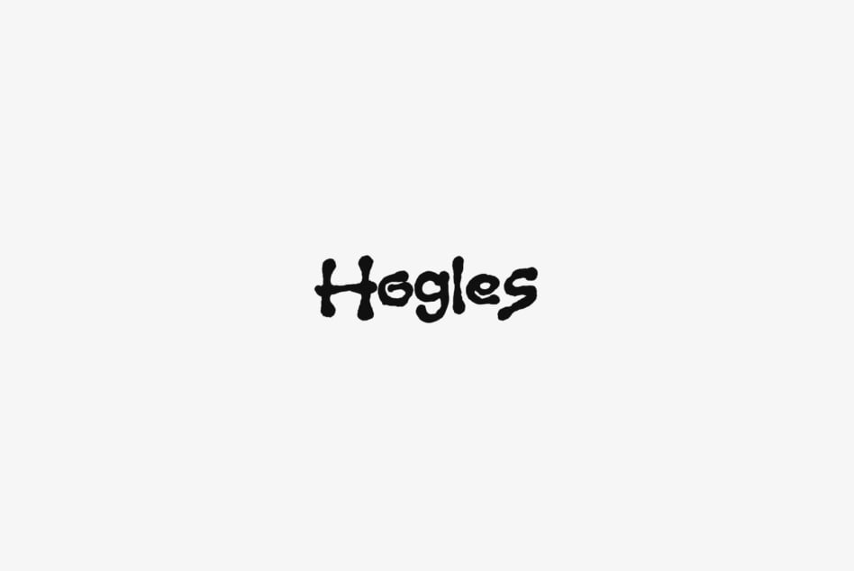 Hegles playful black handwritten font on light gray background