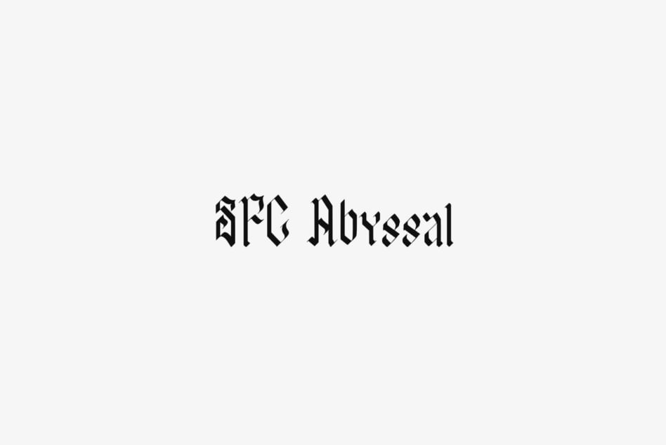 SFC Abyssal gothic font with sharp angular letterforms on light background
