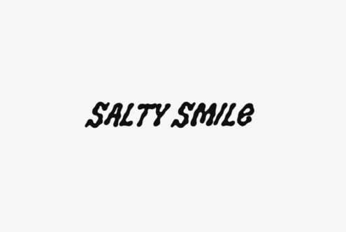 Bold italic typeface reading "Salty Smile" centered on light background