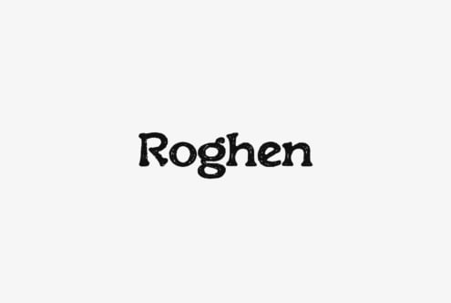 Roghen typeface with rough textured strokes on light gray background