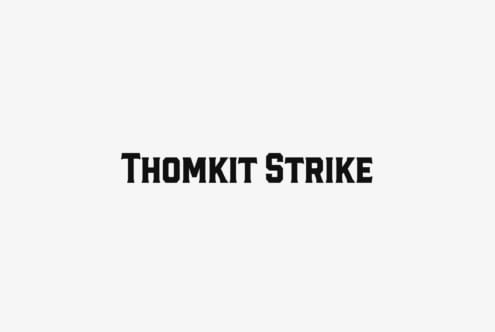Thomkit Strike bold typeface displayed on light gray background