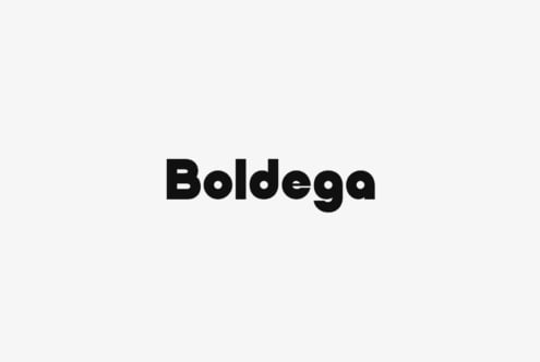Boldega typeface in heavy black weight centered on light gray background