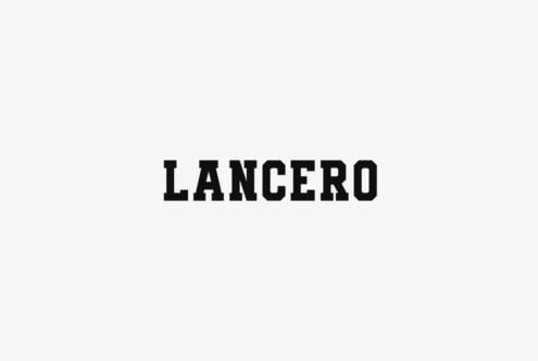 Lancero slab serif font in bold black letters on light gray background