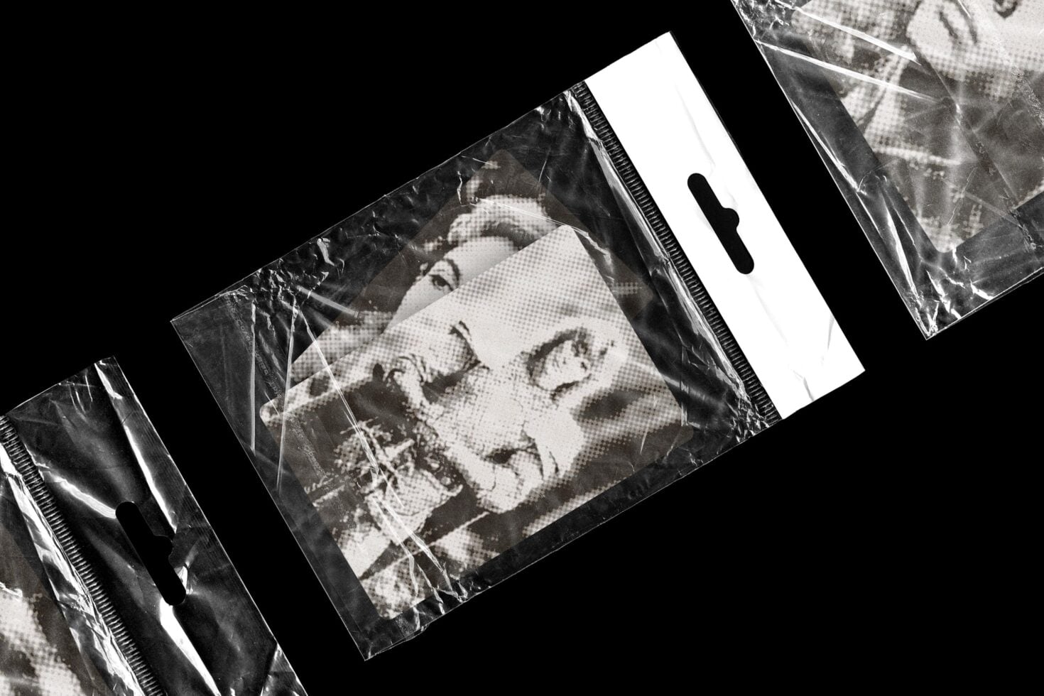 Clear plastic bags with black halftone portrait photo on white label mockup