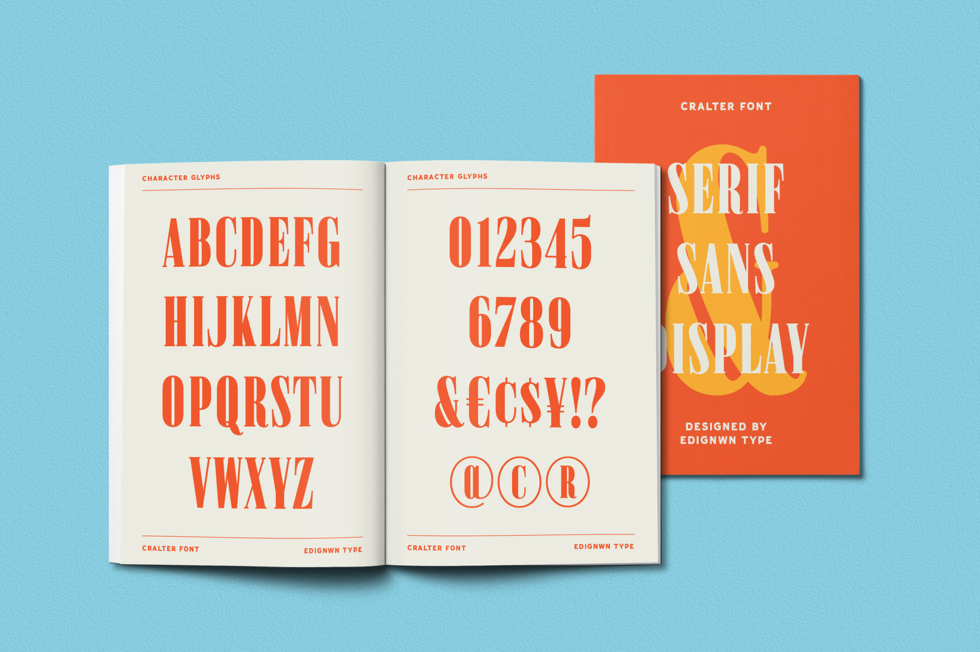Cralter font character set displayed across open book pages with orange serif type samples