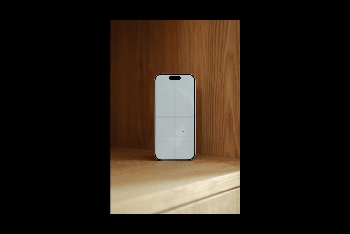 iPhone 14 Pro mockup on wooden table with warm studio lighting