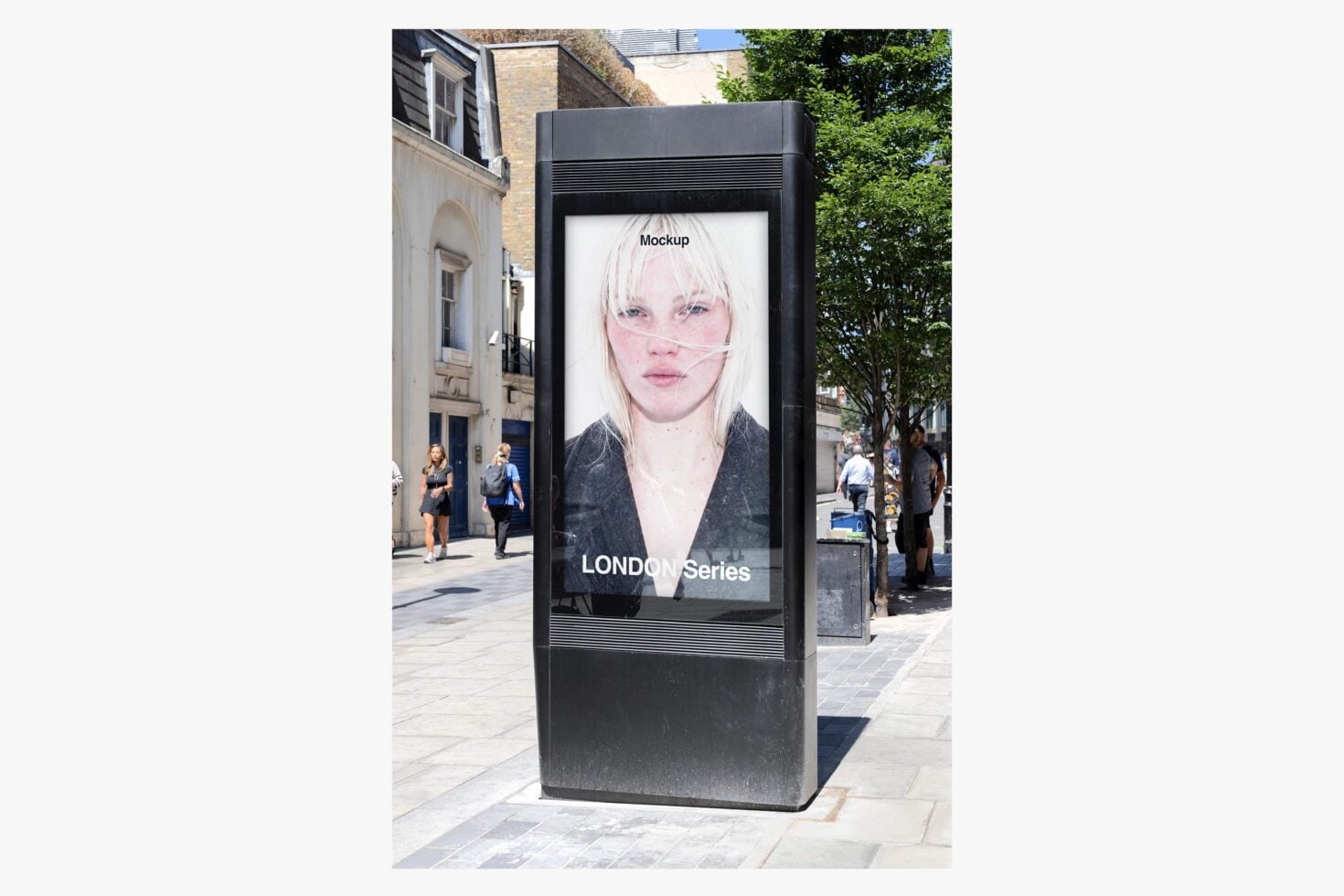 Street billboard mockup showing portrait display on black digital kiosk in urban setting