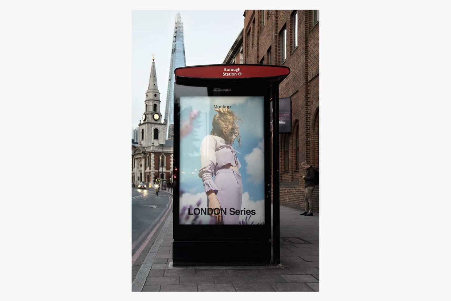 London bus shelter mockup displaying fashion poster with woman in lavender outfit against sky background