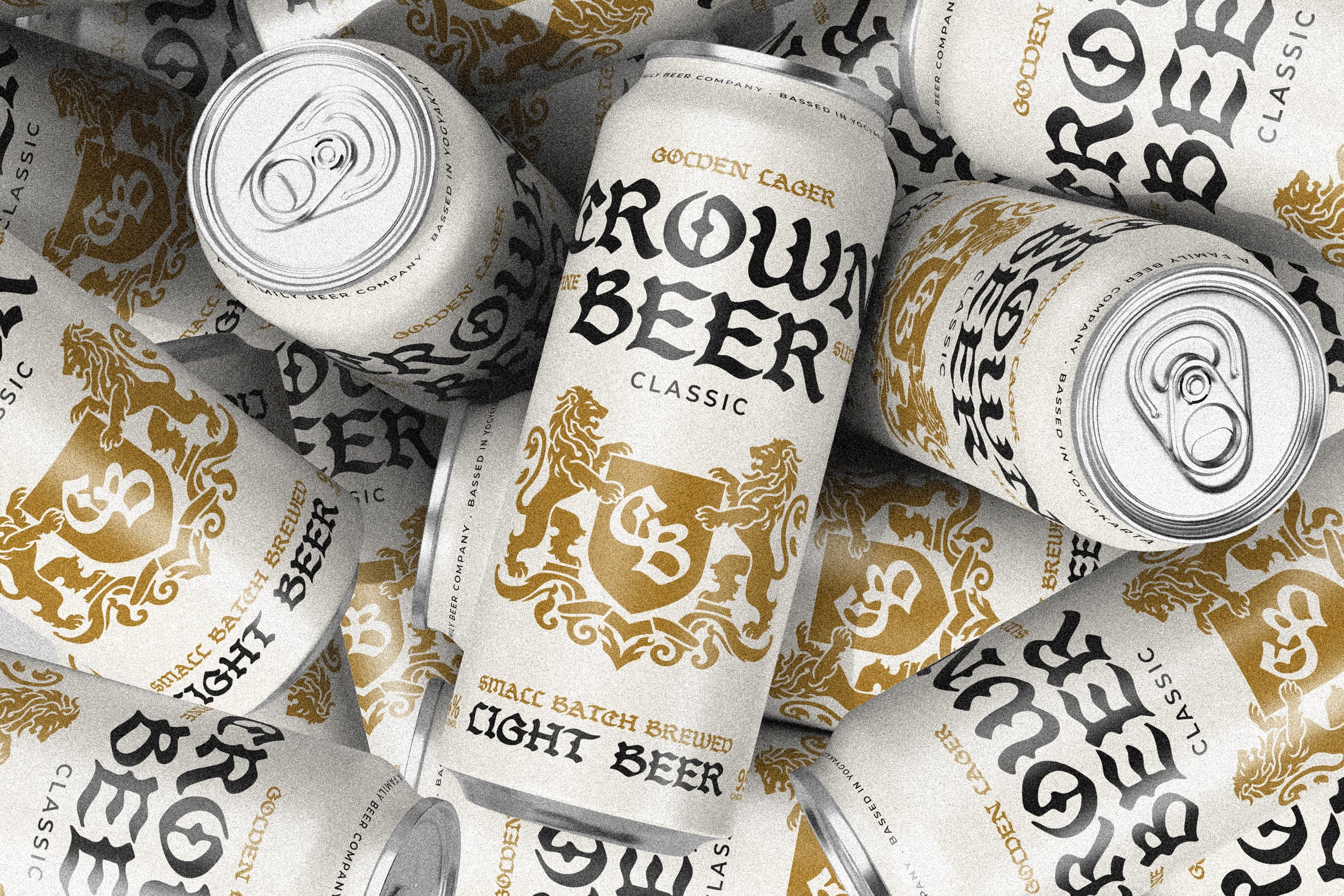 Beer can mockup with ornate gold lettering, bold typography, classic lager branding on white cans