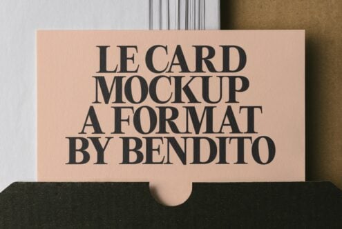 Beige lecard mockup in black envelope with serif typography on textured background
