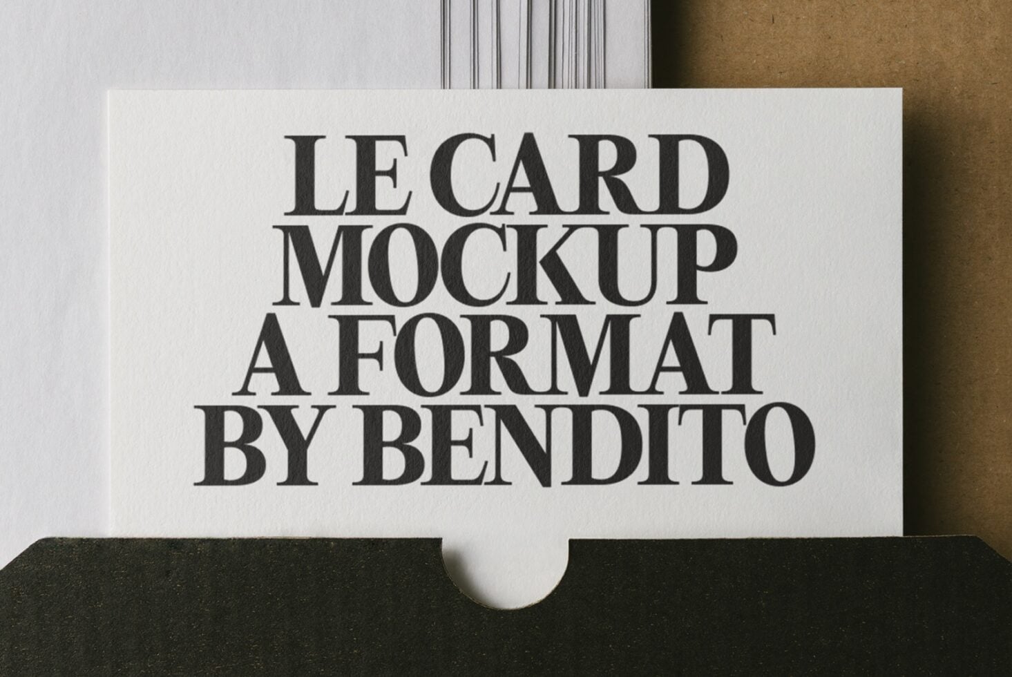 Cream card mockup in black envelope with serif typography showing custom text placement