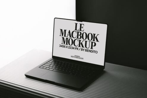 MacBook mockup shot from angle showing screen with customizable display area on dark backdrop