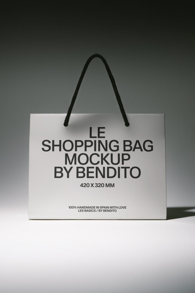 White shopping bag mockup with black rope handles, 420x320mm size displayed on neutral background