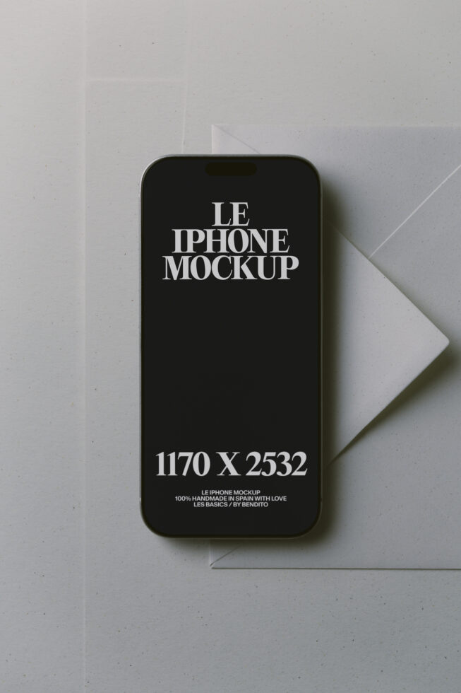 Black iPhone on minimal white background with geometric paper elements