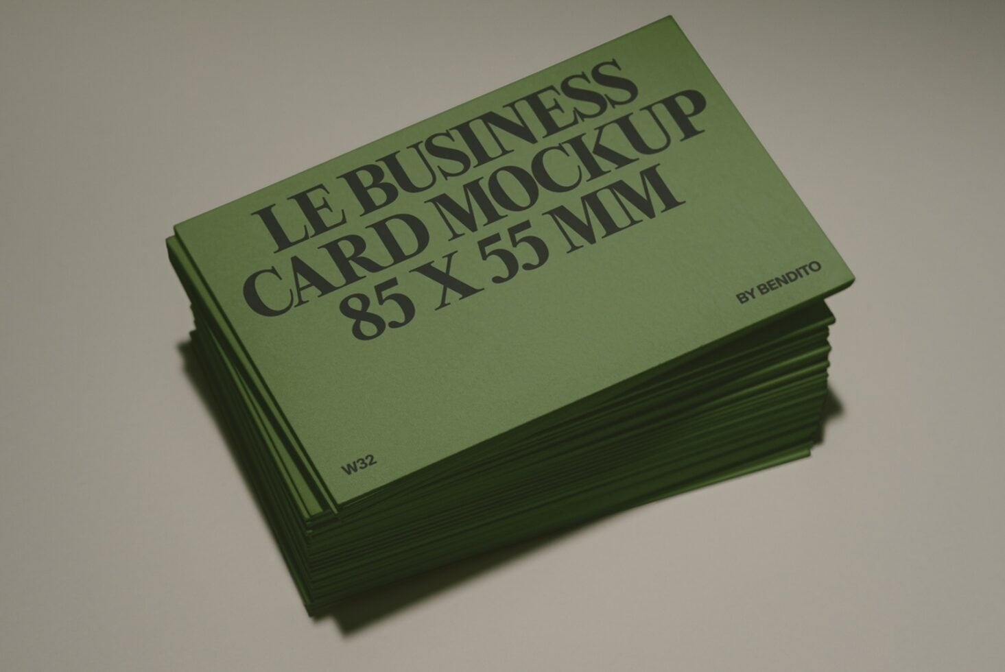 Stack of olive green business cards with typography mockup, 85 x 55mm