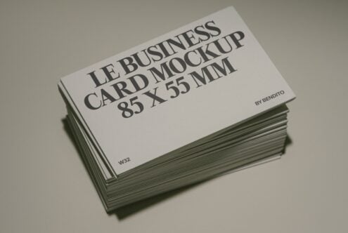 Stack of business cards 85x55mm mockup shot at angle showing front design