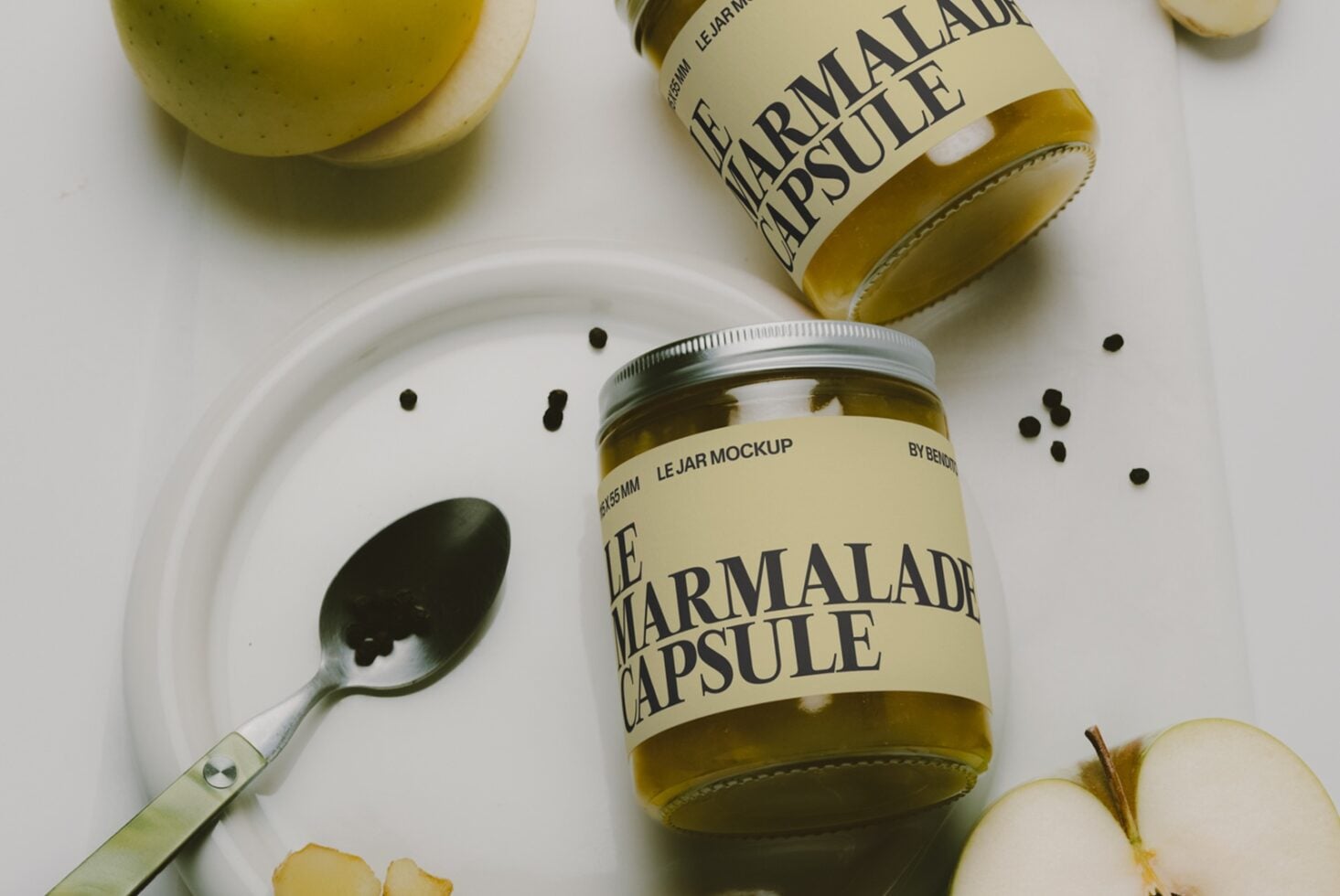 Marmalade jar mockup with bottle, spoon, apples, styled on white surface