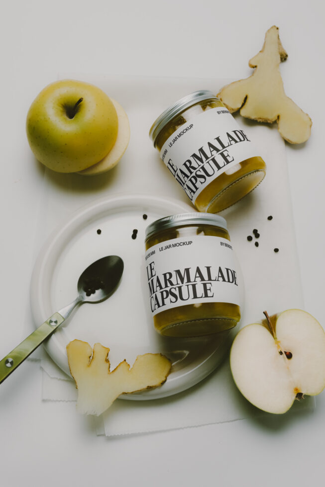 Jam jar label mockup styled with fresh apples, ginger slices, spoon on white plate