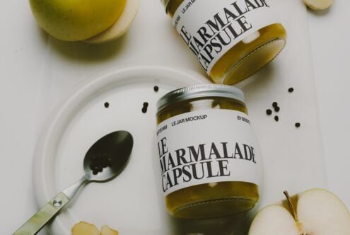 Marmalade jar mockup styled flat lay with spoon, apples, black peppercorns on white surface