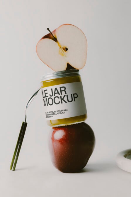 Stacked apples with jar mockup showing apple preserve label, fresh fruit styling