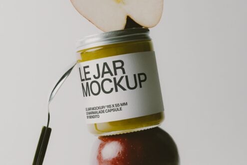 Glass jar with white label showing "LE JAR MOCKUP" surrounded by fresh fruit ingredients