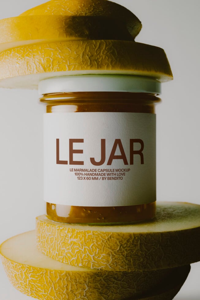 Stacked jam jar mockup with textured yellow label surrounded by fresh lemon slices