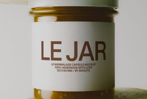 Glass jar mockup with sage green lid, brown text reading "LE JAR" on cream label, marmalade capsule design by Bendito